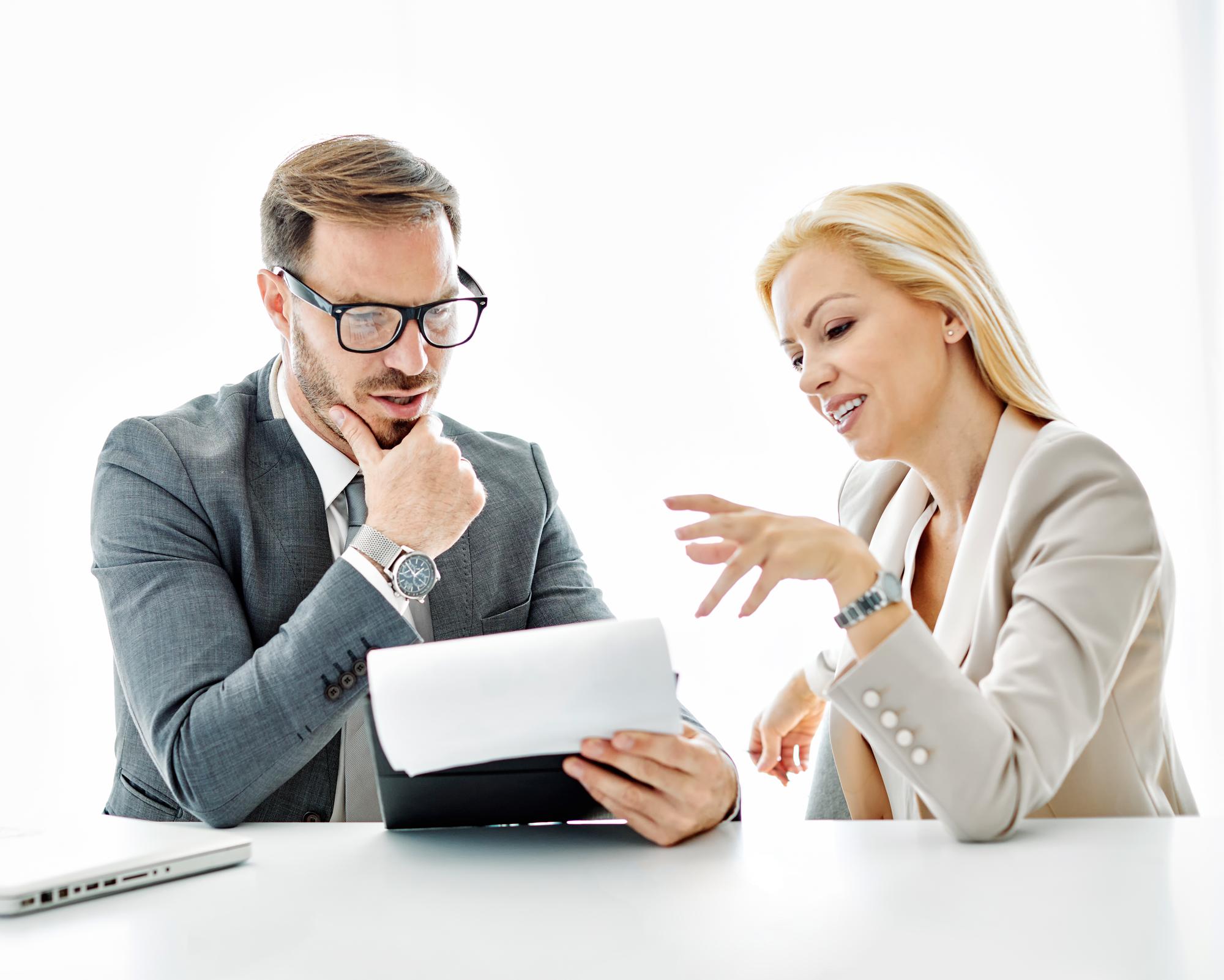 Advisor meeting client in modern office
